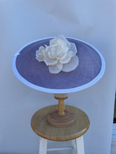 Lavender Parasisal straw hat with white trim and white roses