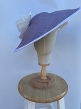 Lavender Parasisal straw hat with white trim and white roses